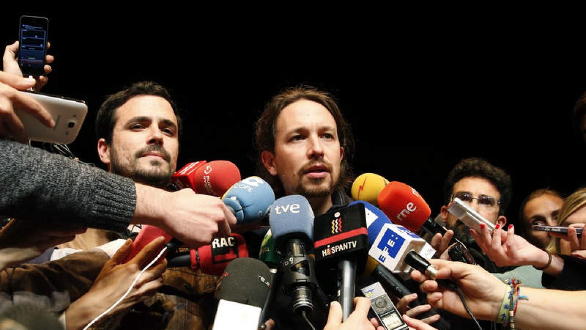 Garzón e Iglesias el día que ambas formaciones llegaron al acuerdo de coalición. BALLESTEROS