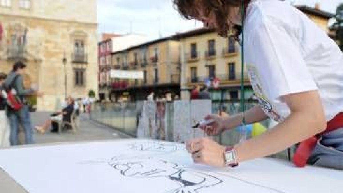 Un momento de la preparación ayer del libro gigante por una vida sin malos tratos