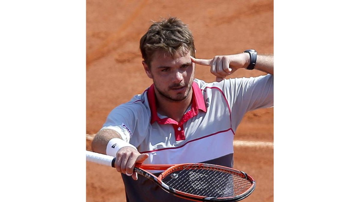 Wawrinka celebra su victoria ante el francés Tsonga.
