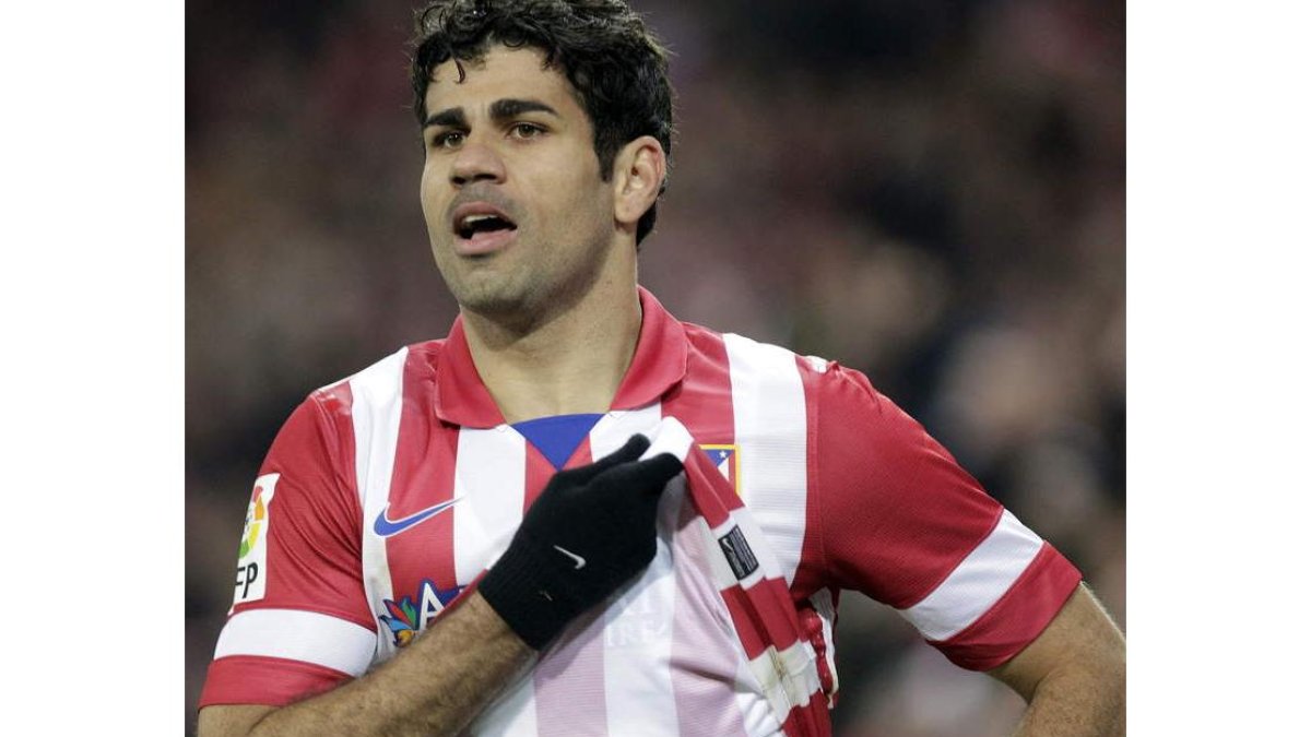 Diego Costa celebra su gol tras marcar ante el Espanyol.