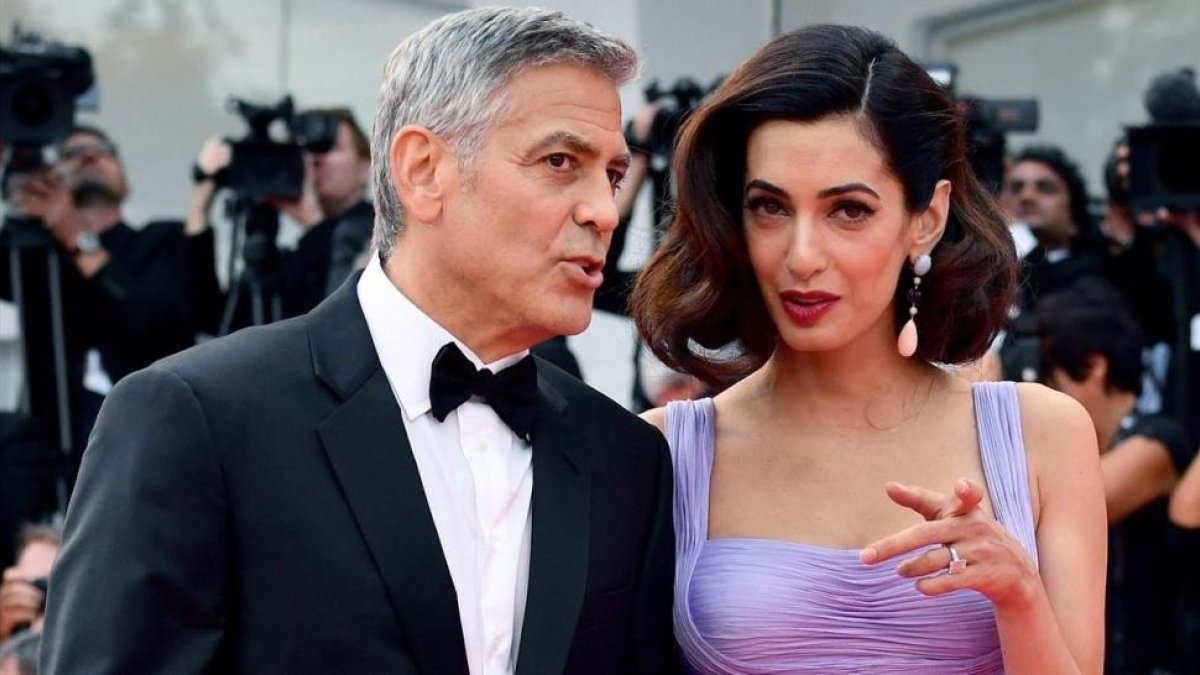 George Clooney y su mujer, Amal Alamuddin, a su llegada al Festival de Venecia, el pasado 2 de septiembre