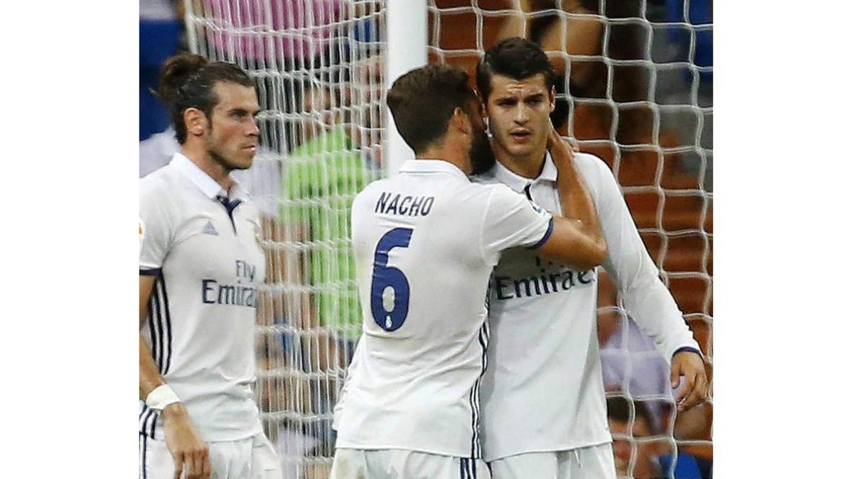 Álvaro Morata celebra su gol, el tercer tanto del equipo blanco ante al Stade de Reims. J. P. GANDUL