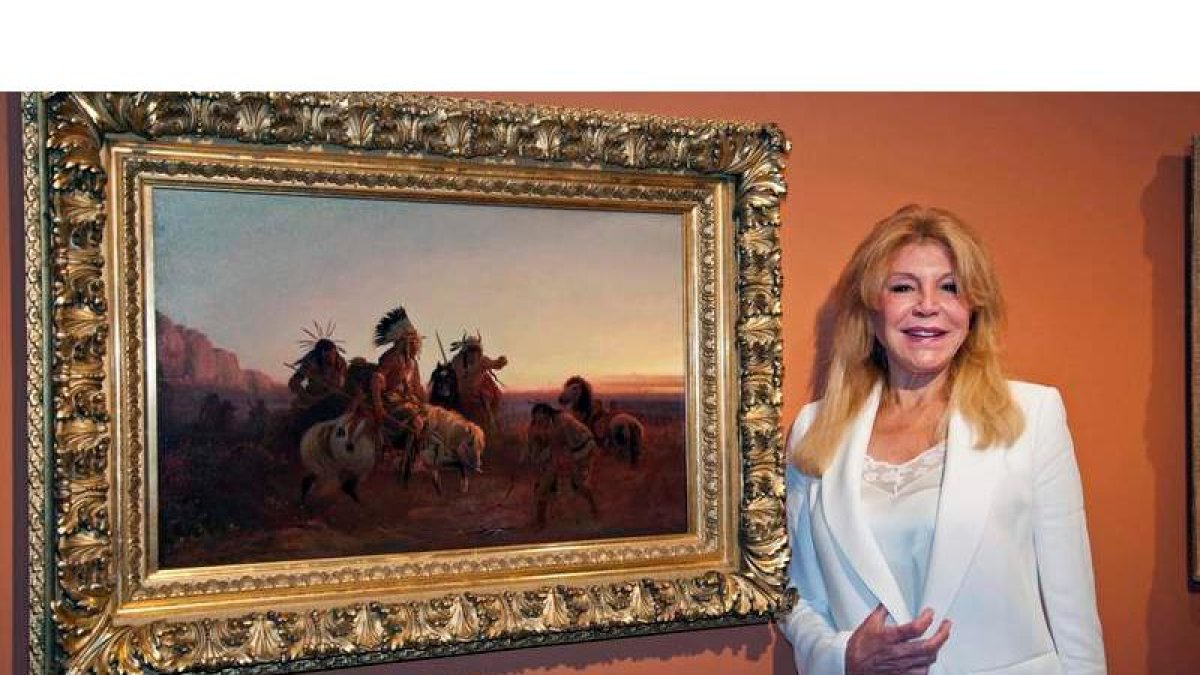 Imagen de archivo de Carmen Thyssen junto a la obra de Charles Winar ‘En busca del rastro’. ROBIN TOWNSEND