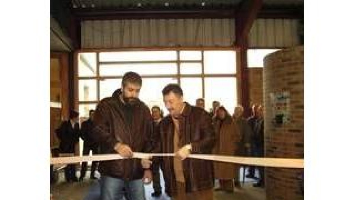Murias y Ángel Calvo, en la inauguración de la muestra