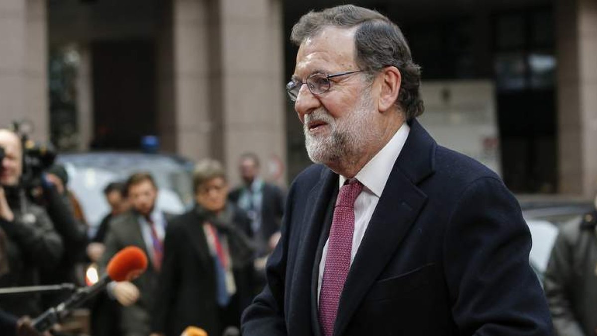El presidente del Gobierno en funciones, Mariano Rajoy, a su llegada a la cumbre de líderes de la Unión Europea. JULIEN WARNAND