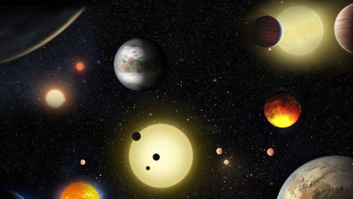 Imagen cedida por la NASA de un concepto artístico de planetas descubiertos por el telescopio espacial Kepler.