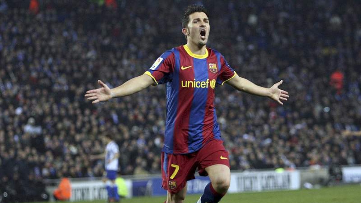 Villa celebra uno de sus goles con el Barcelona.