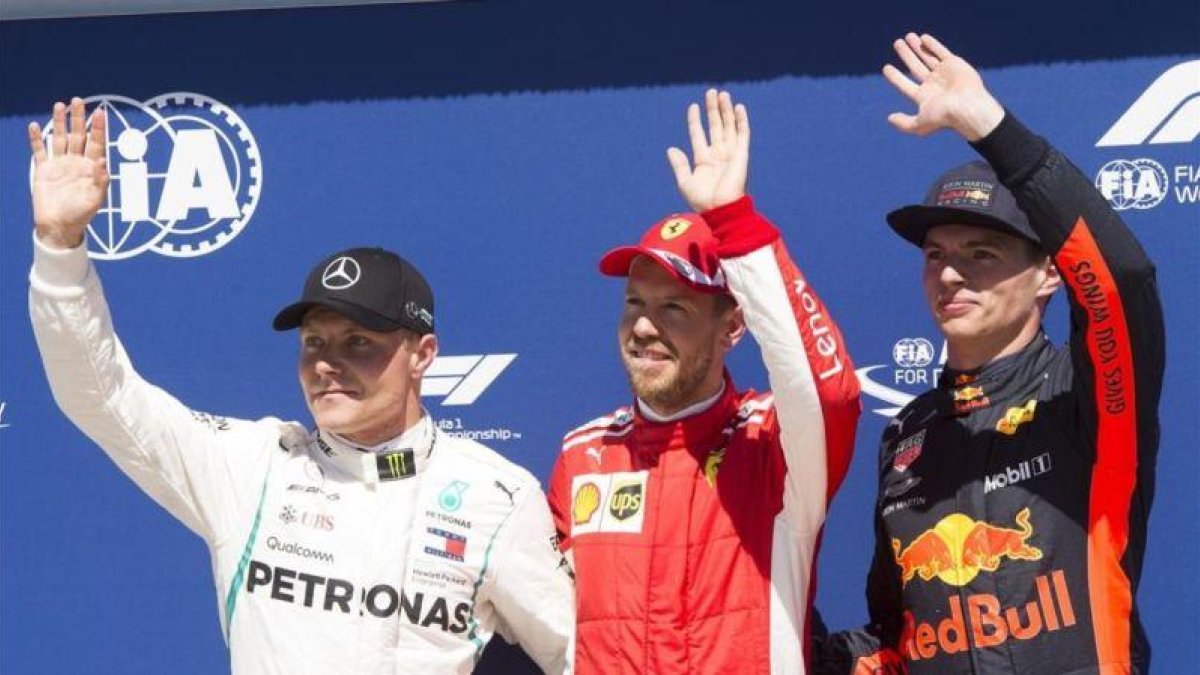 Sebastian Vettel ha logrado hoy la pole en Canadá, siendo más veloz que Valtteri Bottas, a la izquierda, y Max Verstappel, a la derecha.