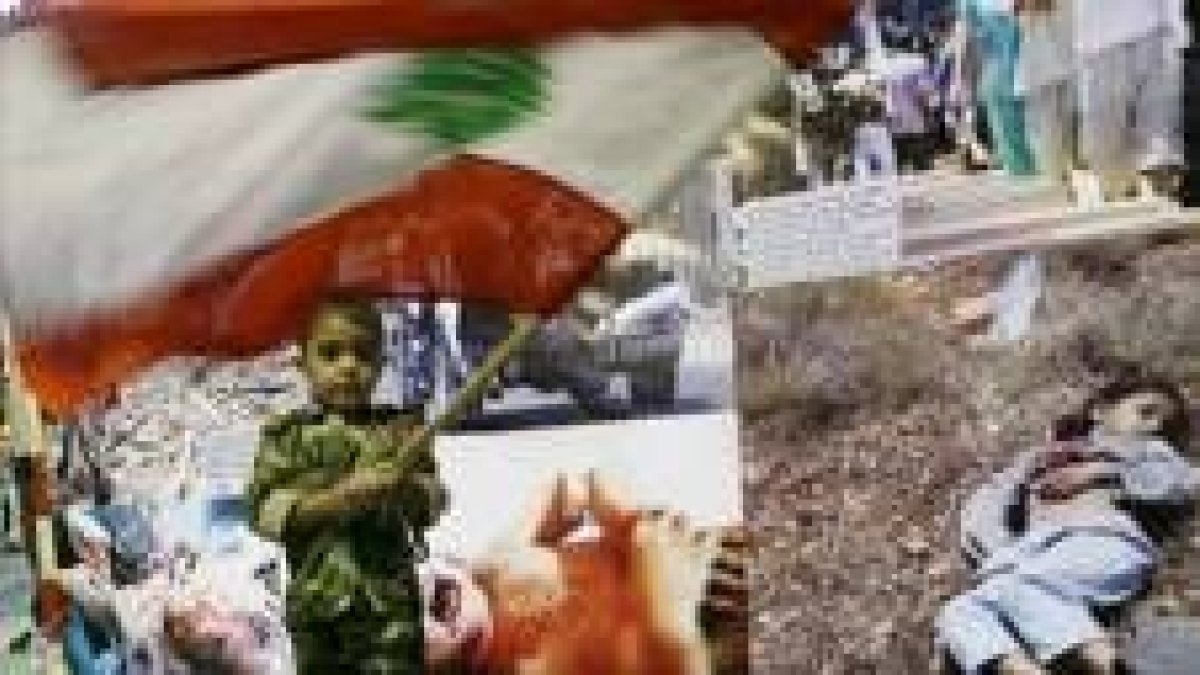 Un niño libanés ondea su bandera delante de las fotos de civiles muertos por ataques israelíes