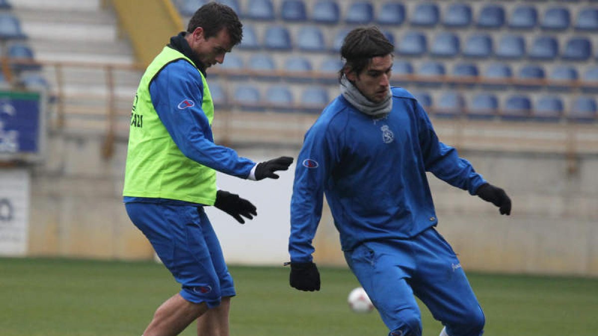Santi Santos y Ortiz durante una sesión de trabajo.