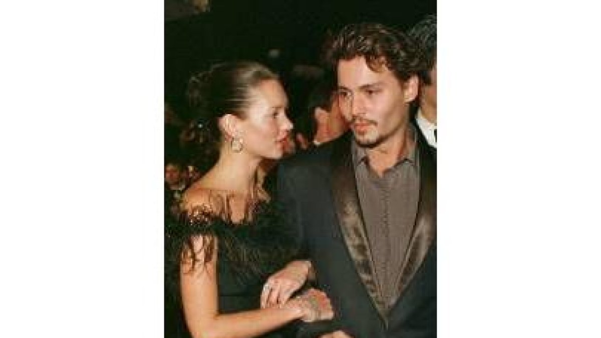 Moss y Depp, en una imagen tomada en su relación