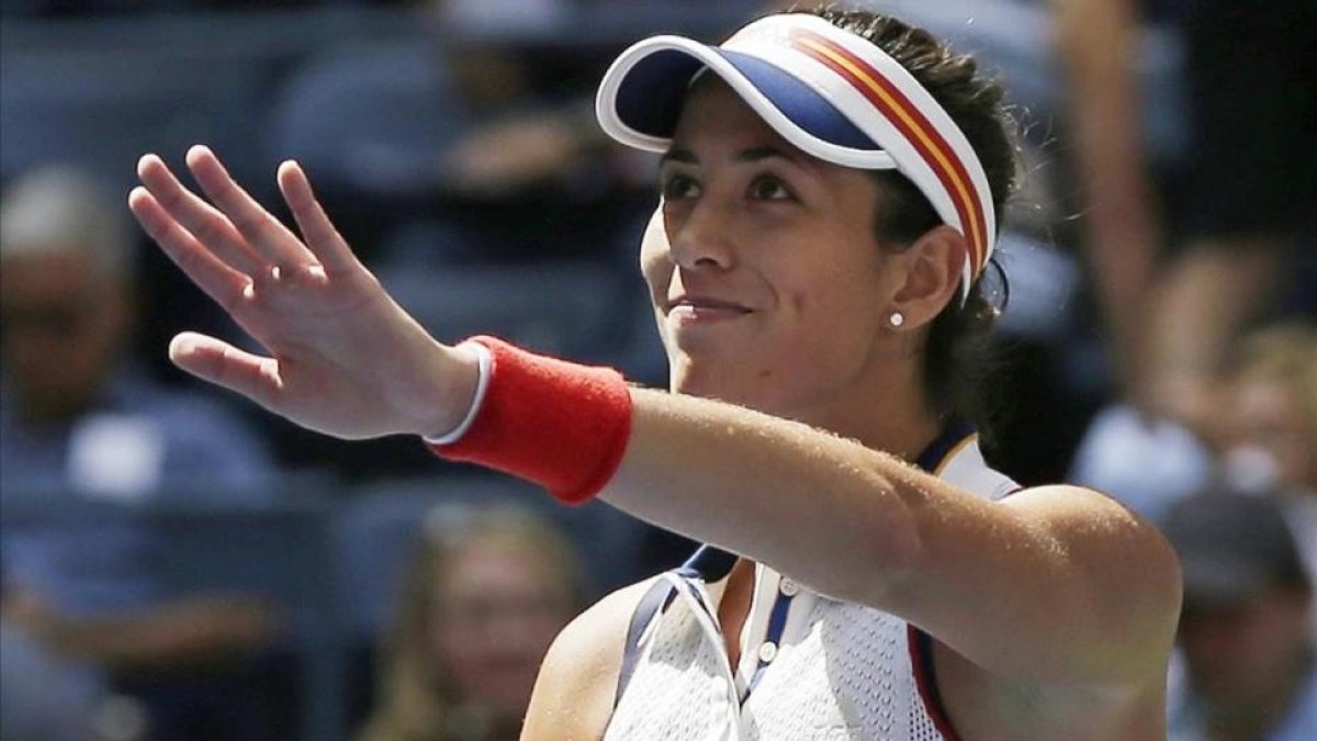 Muguruza saluda tras una victoria en el Abierto de EEUU, este año