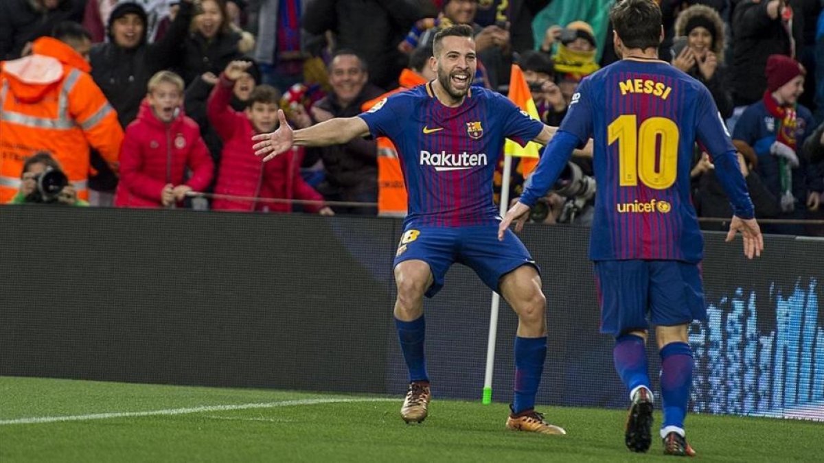 Messi celebra con Alba el primer gol del Barça ante el Celta.