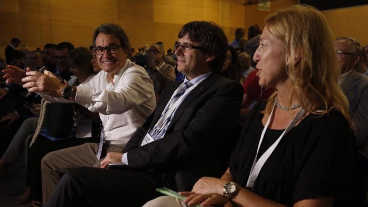Artur Mas, Carles Puigdemont y Neus Munté, en el congreso de refundación de CDC el 8 de julio del 2016.