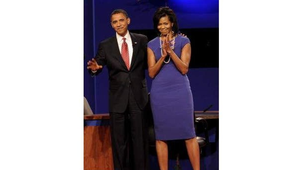 Obama, junto a su mujer, Michelle, hace ahora un año.