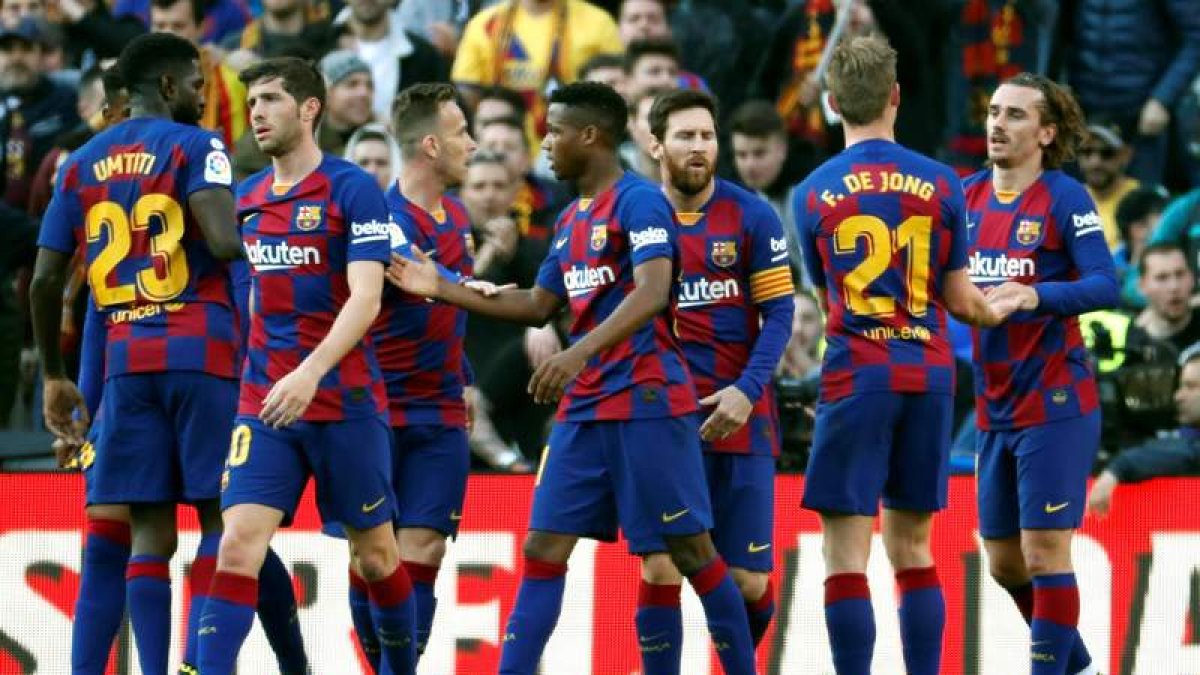 Los azulgranas celebran uno de sus dos goles.