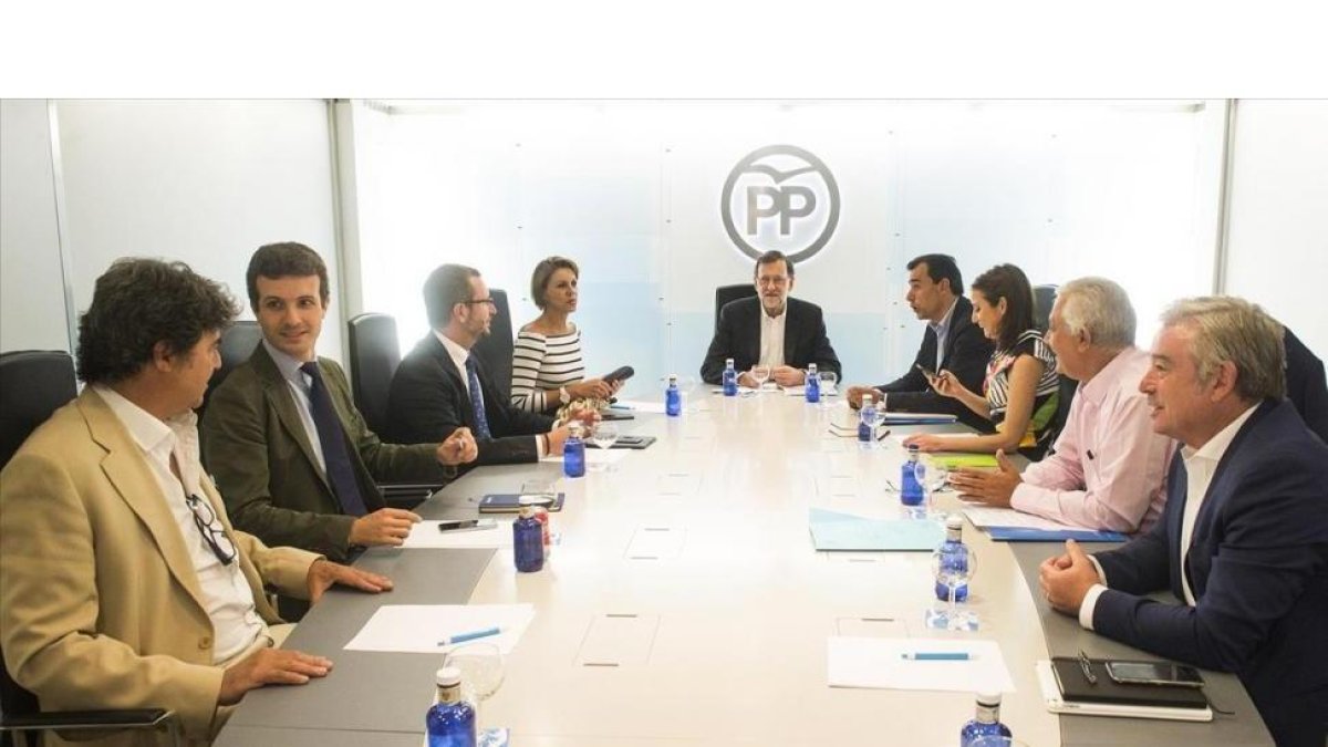 El líder del PP, Mariano Rajoy, al frente de una reciente reunión de su comité de dirección tras verse con Albert Rivera