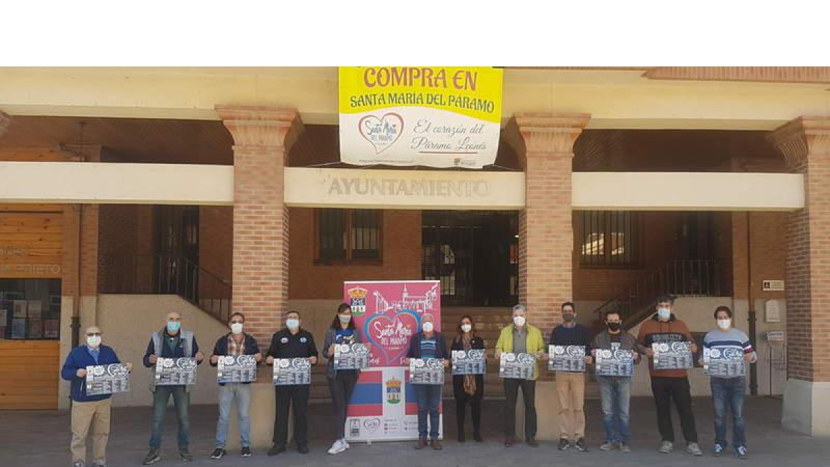 Imagen de profesionales del comercio local de la campaña de bonos sociales. DL