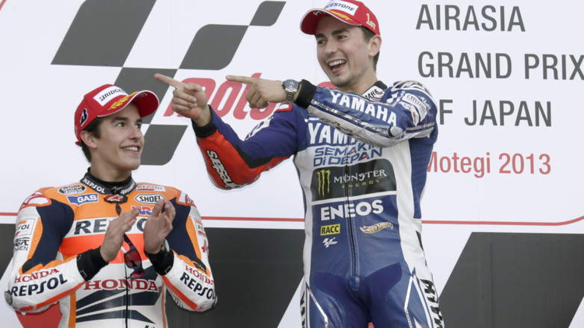 Jorge Lorenzo, primero, y Márc Márquez, segundo, en el podio.