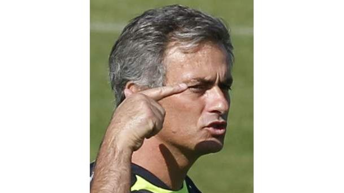 José Mourinho, a la izquierda, y Manuel Preciado.