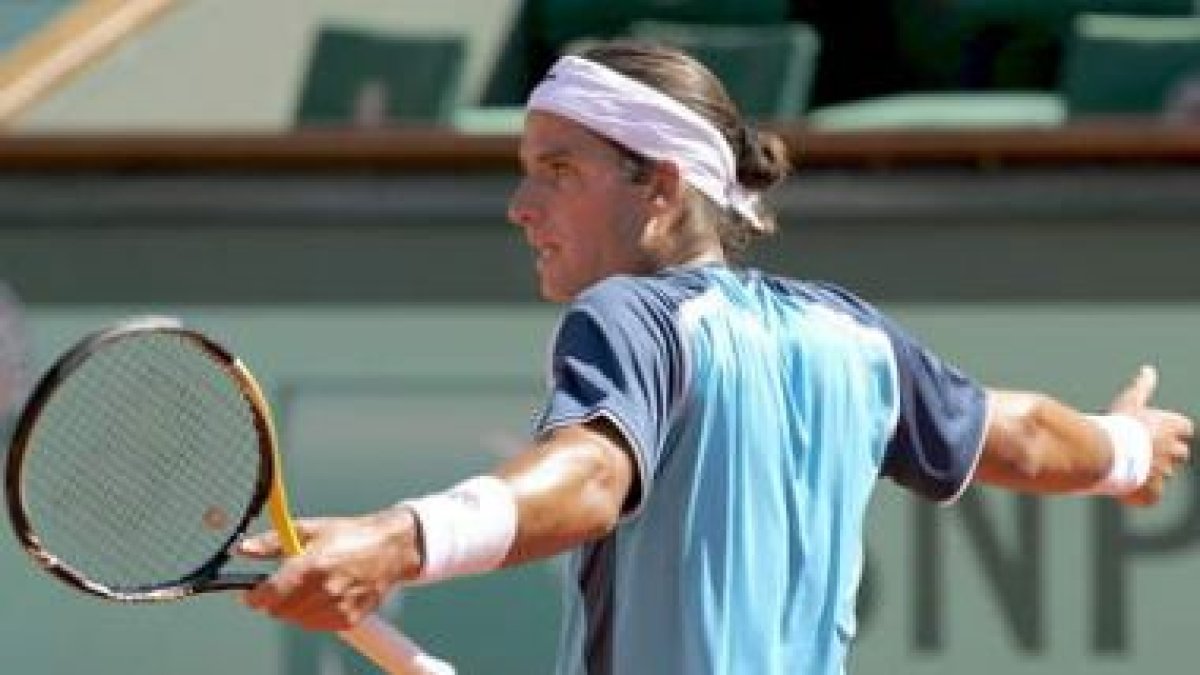Feliciano López se lamenta tras un fallo ante Federer.