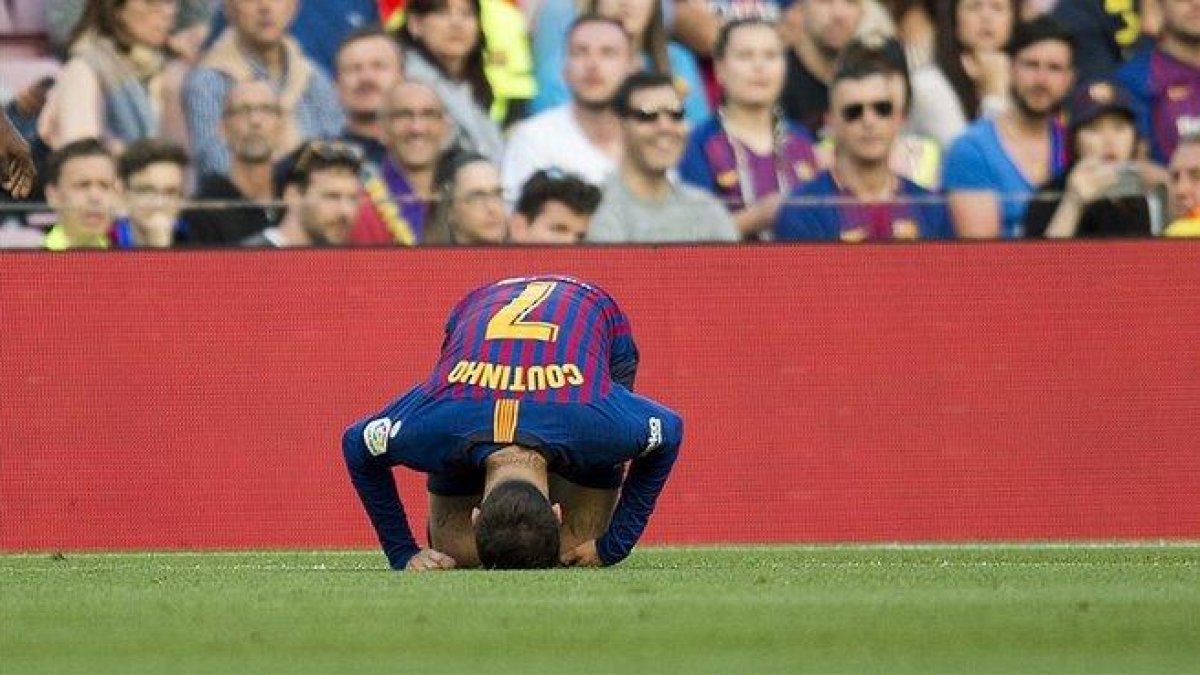 Coutinho doliéndose de un golpe durante el partido ante el Getafe.