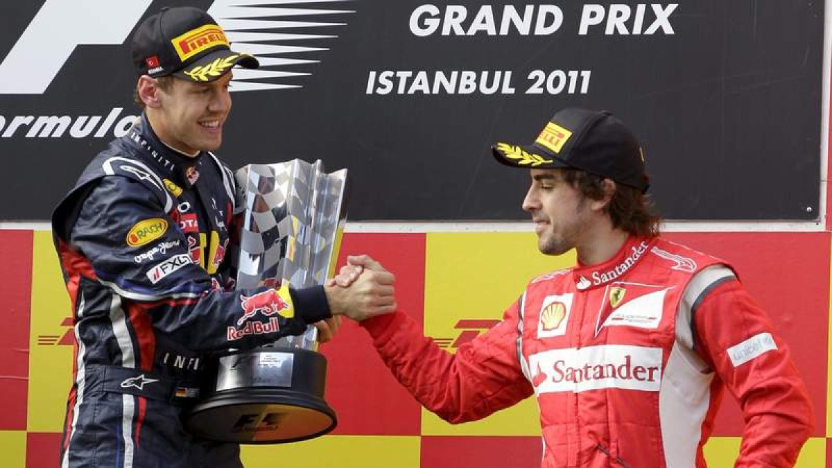 Sebastian Vettel, de Red Bull Racing, y el piloto asturiano Fernando Alonso, de Ferrari.