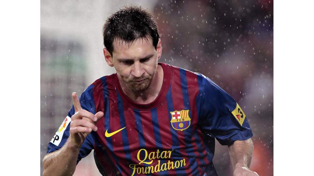Messi celebra su gol, el tercero de su equipo, frente al Atlético.
