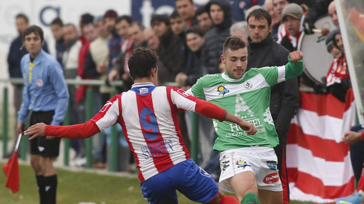 Cristian, a la derecha, es baja esta tarde frente al filial numantino por sanción.