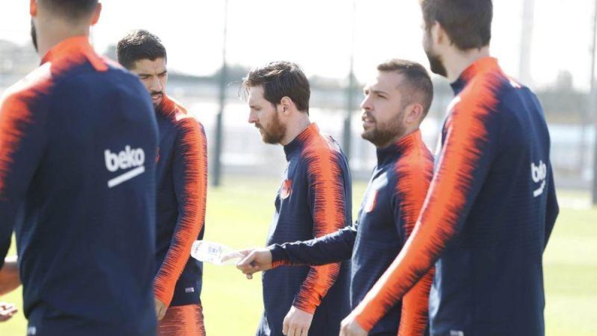 Messi junto a sus compañeros del Barça.