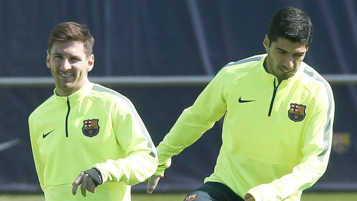 El argentino Leo Messi, a la izquierda, y Luis Suárez durante el entrenamiento del Barcelona
