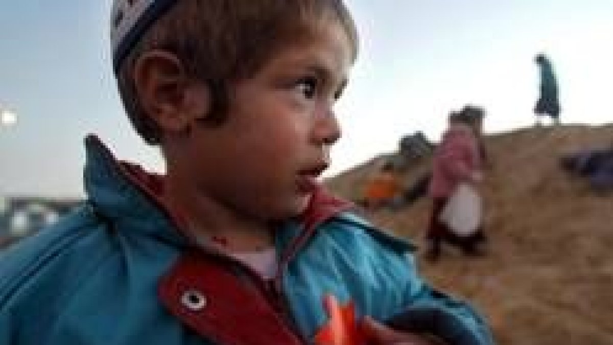 Un niño de una colonia judía de Gaza con la estrella de David naranja en su pecho