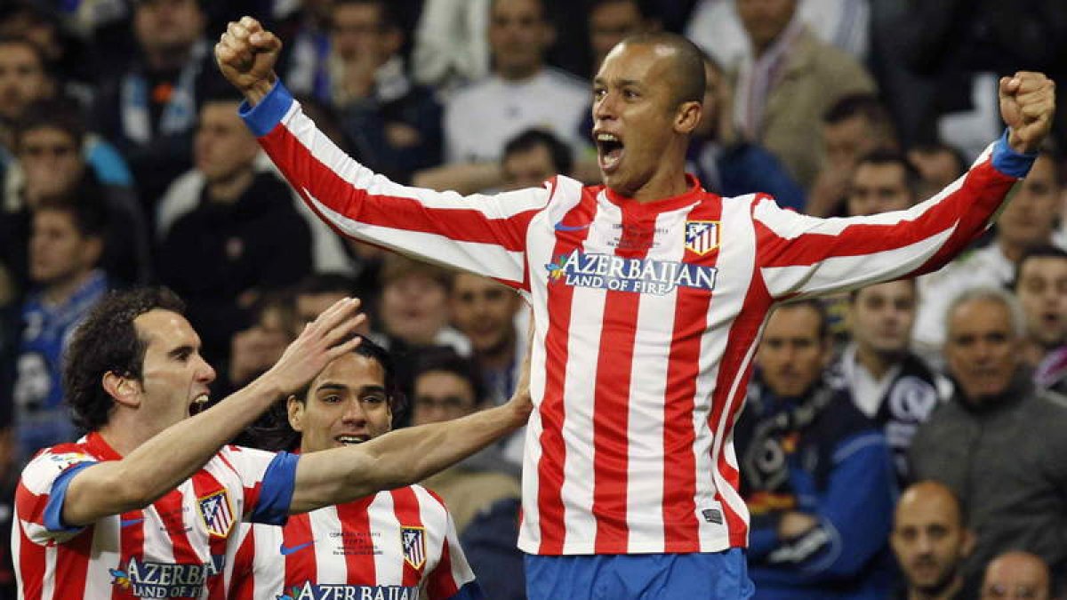 El defensa brasileño del Atlético de Madrid, Joao Miranda, celebra la consecución del segundo gol, en la prórroga, ante el Madrid.