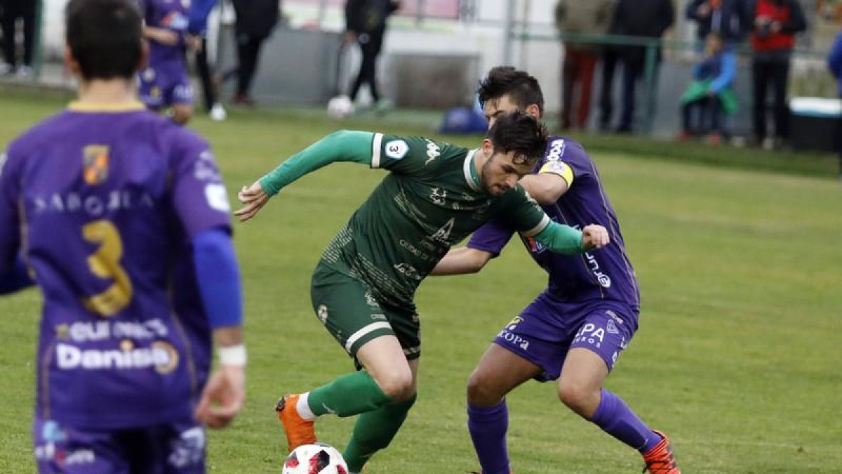 Un momento del partido Atlético Astorga-Cristo Atlético.