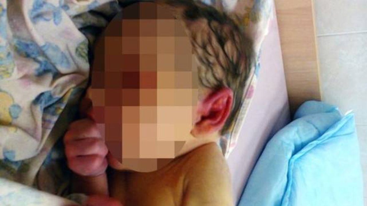 Cristina, el bebé localizado en medio de un bosque en Rusia.