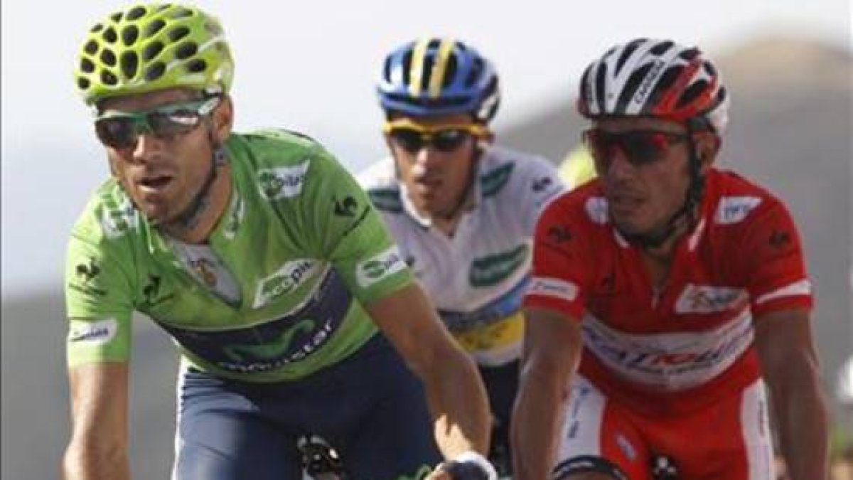 Valverde y Purito, con Contador (ausente este año), en medio, durante la Vuelta 2012.