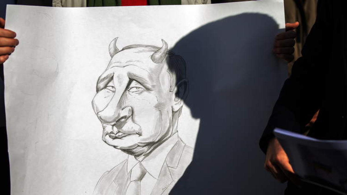 Imagen de una caricatura de Putin en una manifestación en Kiev. DIMITRI DURU