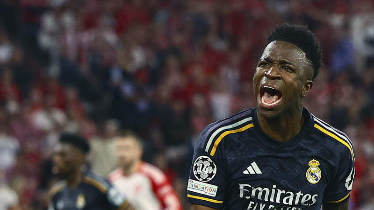 Vinicius celebra uno de sus goles al Bayern. El brasileño firmó un doblete para los blancos en el exigente partido de Múnich. SINGER