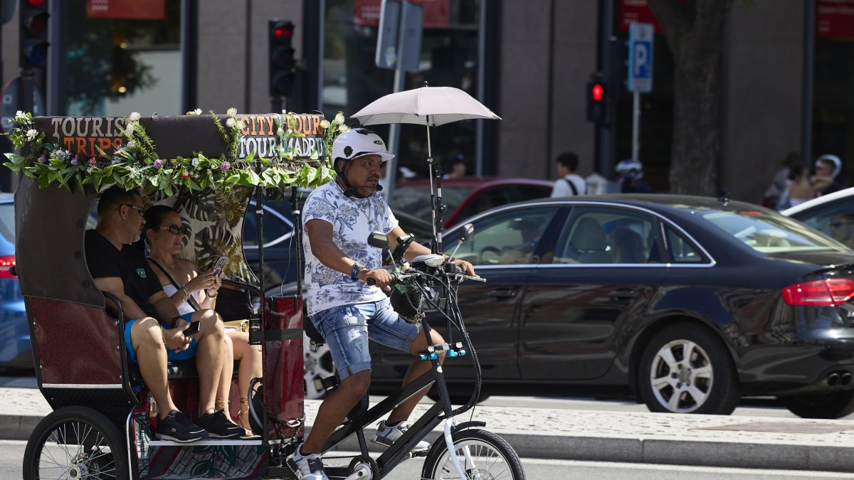 Unos turistas en un Tuk Tuk
