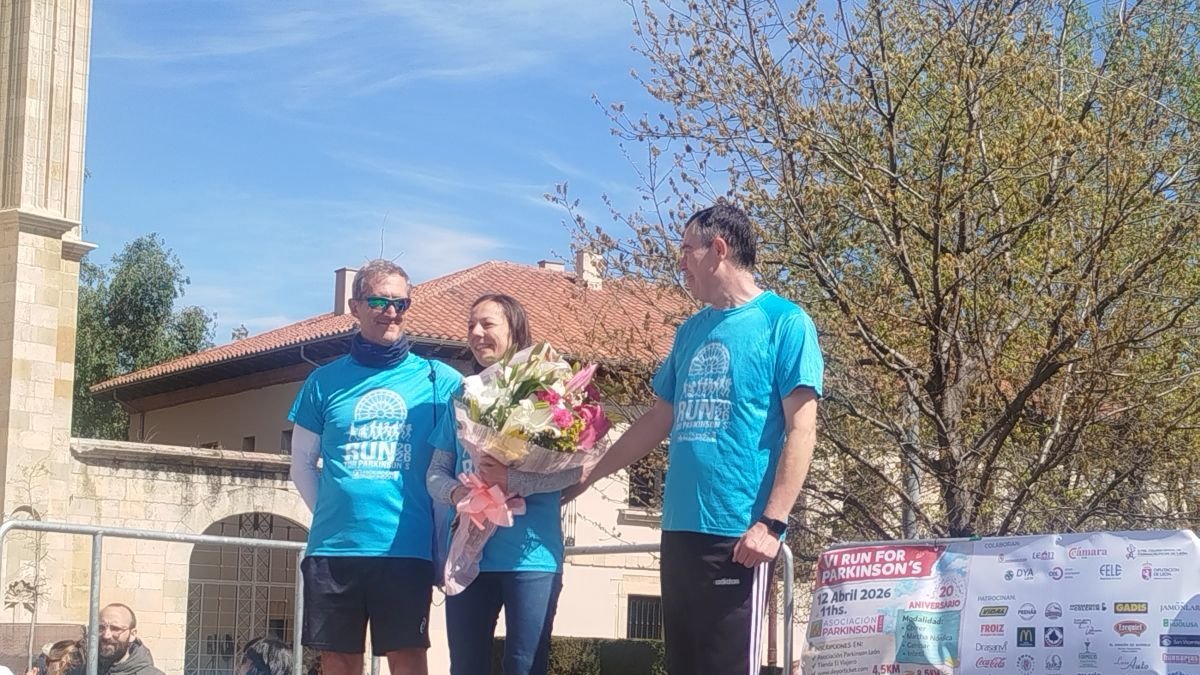 Nuria con Alberto y Juanjo, compañeros en el campeonato.