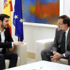 El candidato de IU a la presidencia del Gobierno, Alberto Garzón, y Mariano Rajoy.