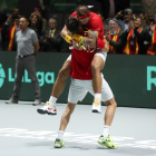 Rafa Nadal  y Marcel Granolles celebran su victoria en el partido de dobles que han disputado frente a la pareja Argentina. EFE