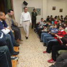 Martín Leiva, Eulís Báez y De Grado durante su alocución a los alumnos del colegio San Claudio