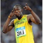 El jamaicano Usain Bolt reacciona tras la semifinal de los 200 metros
