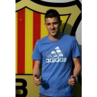 Villa ante el escudo del Barça.
