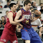 Lorbek defendido por Bjelica durante el partido.