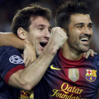 Messi celebra con Villa uno de los goles del argentino esta temporada.