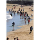 Playa de Gijón, ayer. ELOY ALONSO