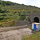 Túnel de la Perruca, emblema de la Rampa y logotipo de la plataforma. RAMIRO