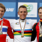 Valverde, a la derecha, luce el bronce conseguido en la prueba en ruta mundialista. Gilbert viste el arcoíris y Boason Hagen la plata.